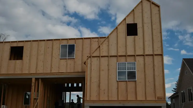Illustrative: Yarrow Point residential exterior remodel context — Pacific Northwest light; not a real Board job photo
