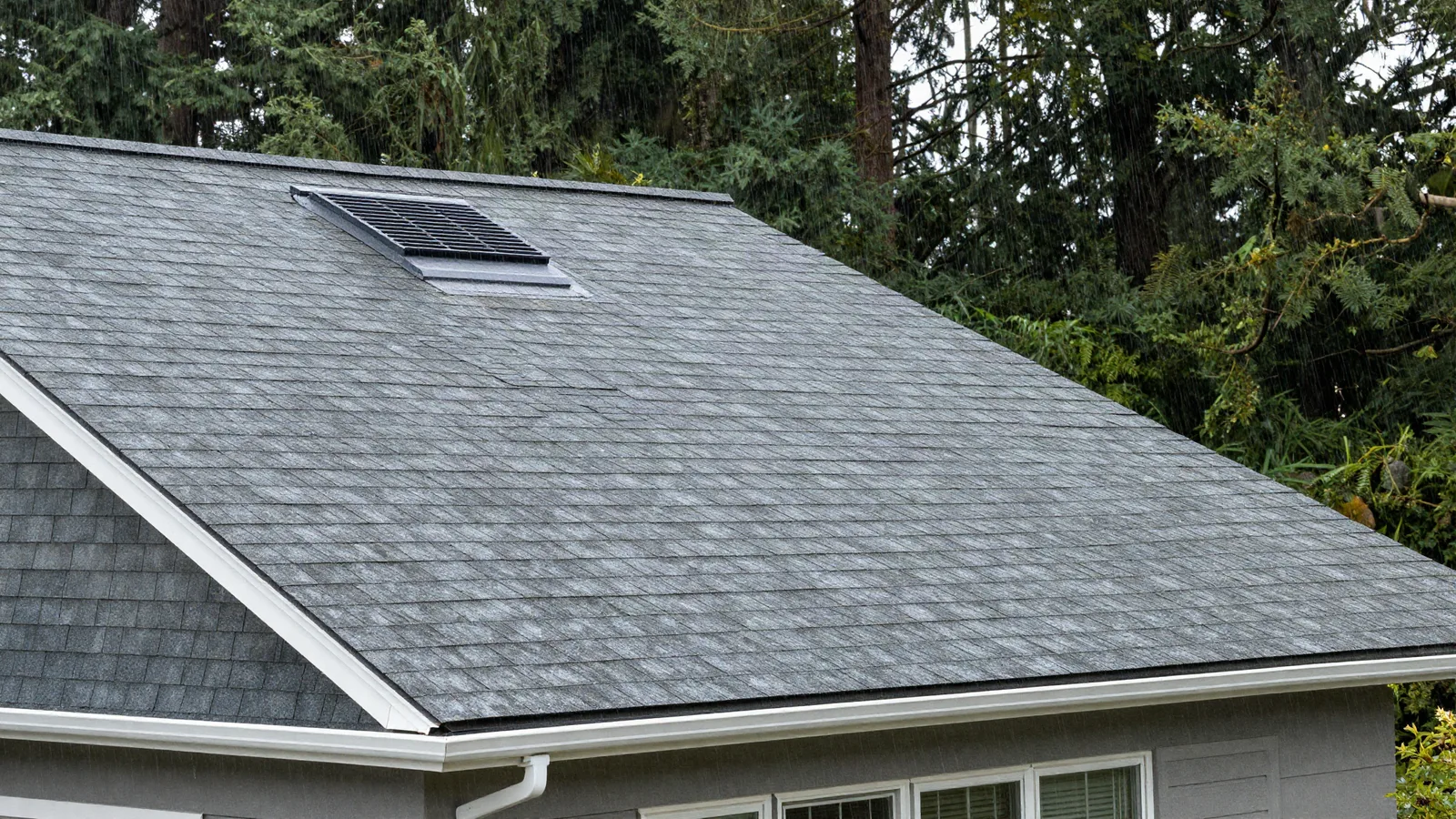 Illustrative finished architectural shingle roof on a coastal Washington home — illustrative only, not a real job photo